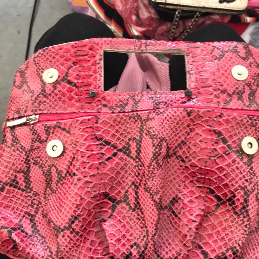 Pink and black snake skin